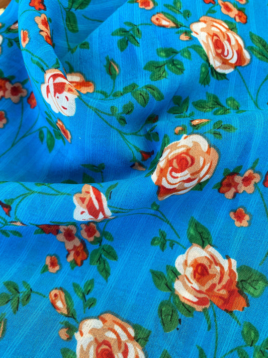 Gasa Chiffon Azul Floreado Naranjo